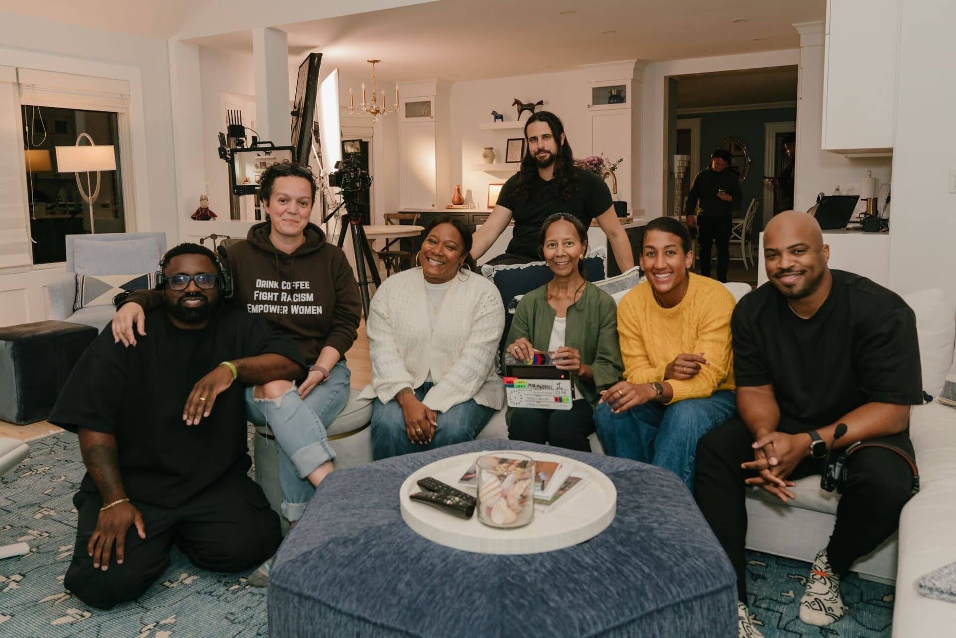 Behind the scenes — full cast and crew group portrait