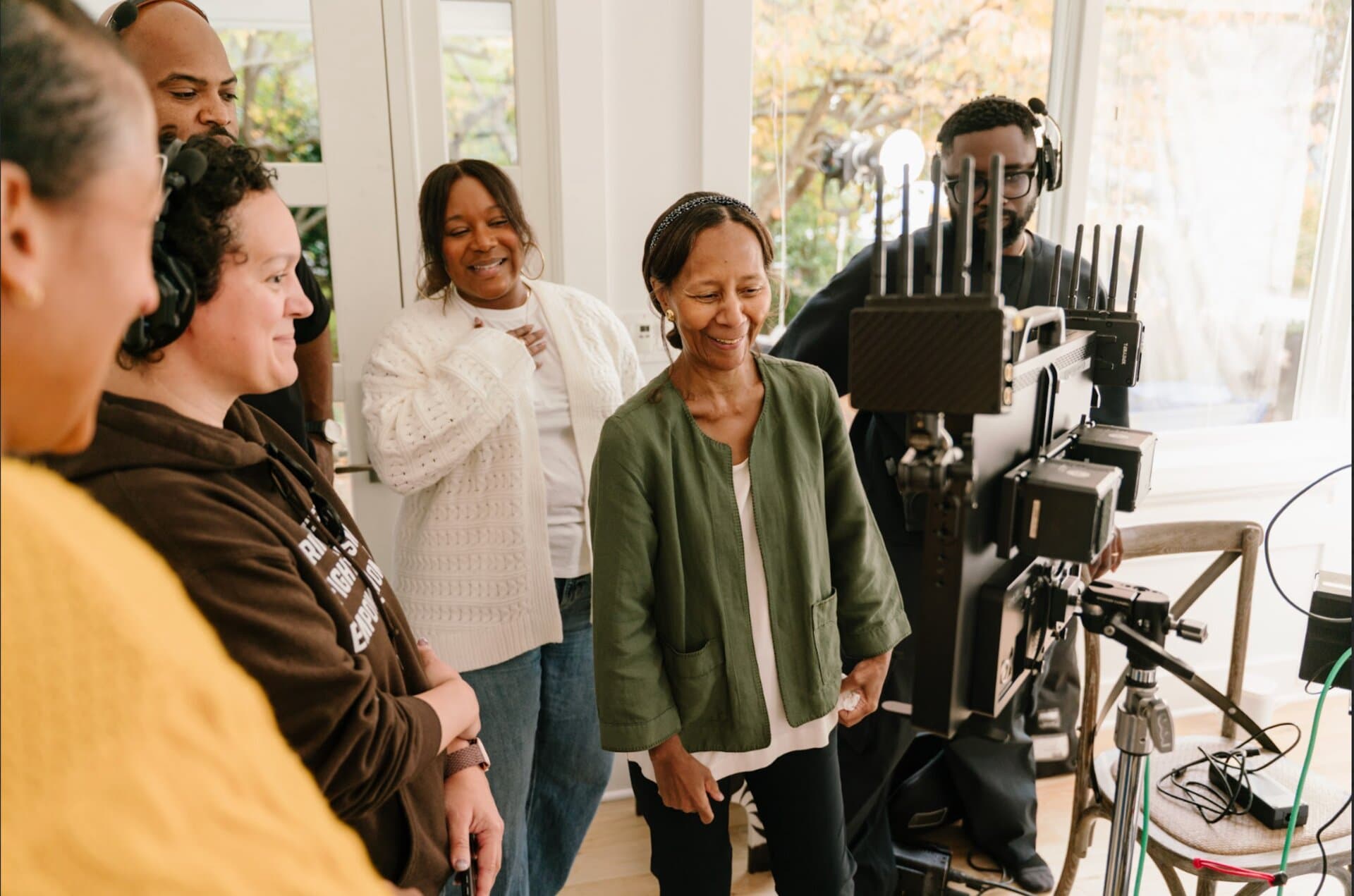 Behind the scenes — Dr. Marian Croak with crew at playback